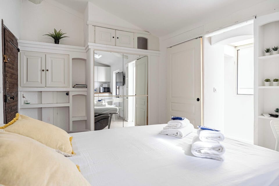 Apartment | Laptop workspace, iron/ironing board, bed sheets