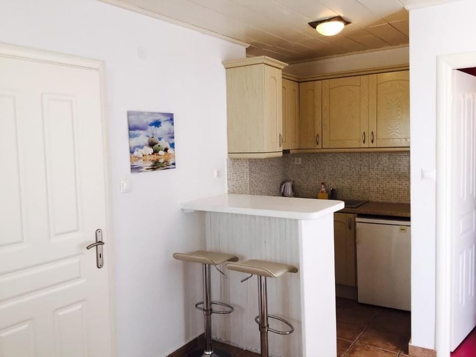 Family Apartment, Garden View | In-room safe, free WiFi