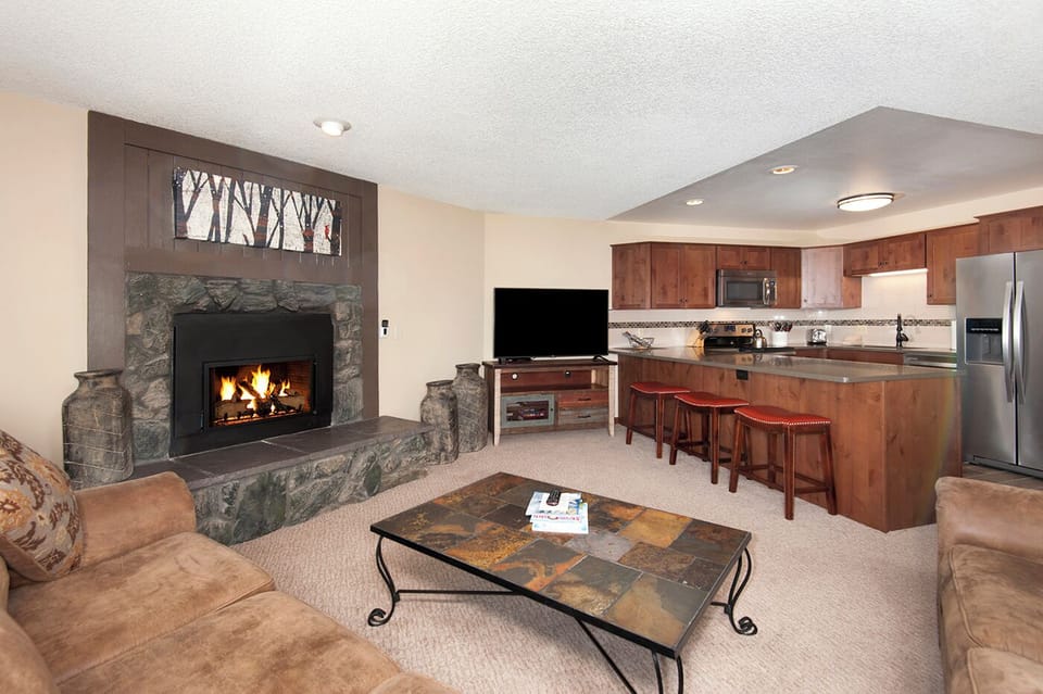 Living Room with Gas Fireplace, Streaming SmartTV, Views of Kitc