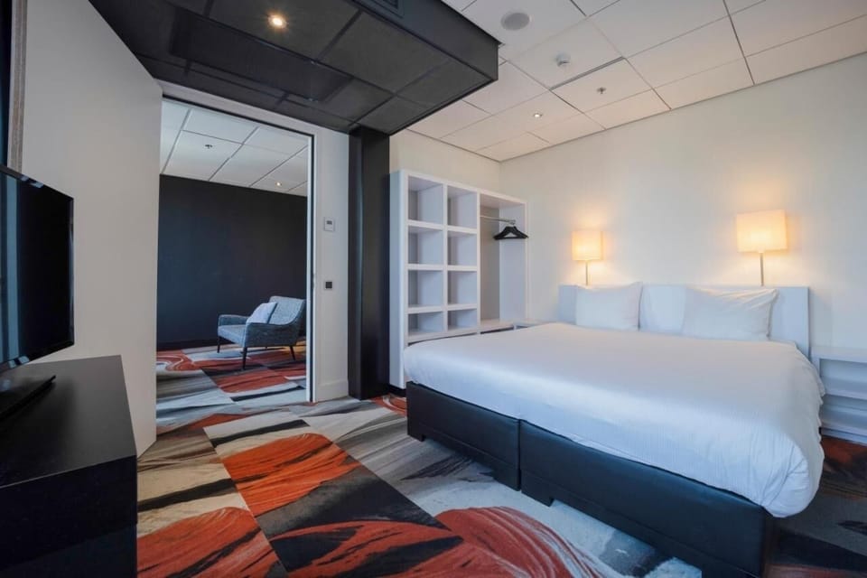 Settle in easily with in-room safe and open storage.