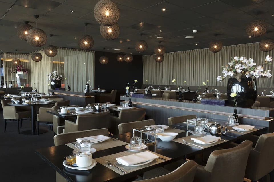 Dine under warm pendant lights in an intimate setting.