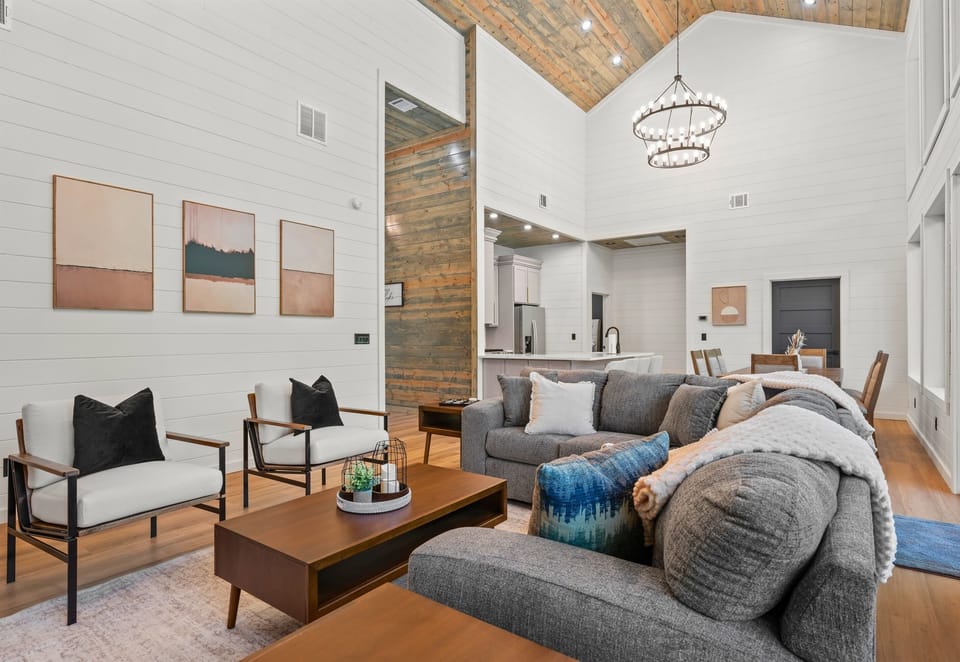 Whether you’re watching TV or chatting with friends, this cozy living area creates the perfect place to unwind together.
