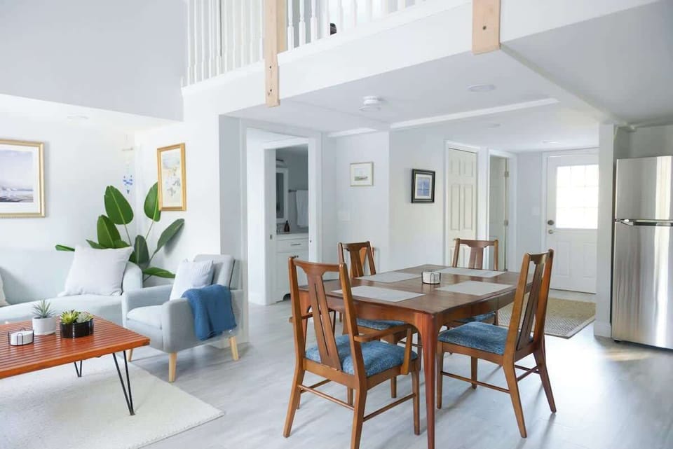 Additional chairs and table leaf available.