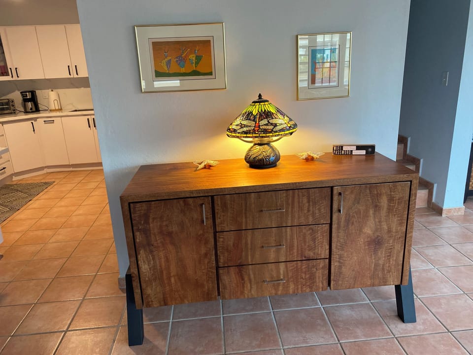 Credenza -Sample of unique woodwork throughout the home