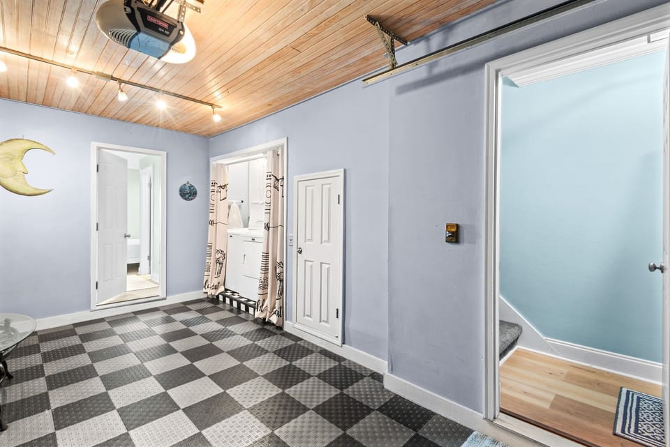 The Garage features convenient in unit Washer and Dryer and access to Bedroom 3