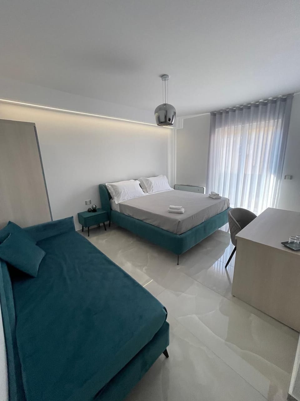 Comfort Triple Room, Balcony | Minibar, in-room safe, desk, laptop workspace