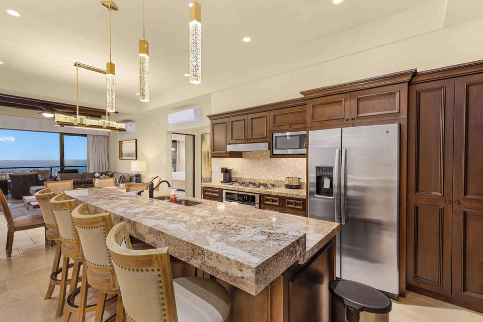 Spacious gourmet kitchen with granite counters.