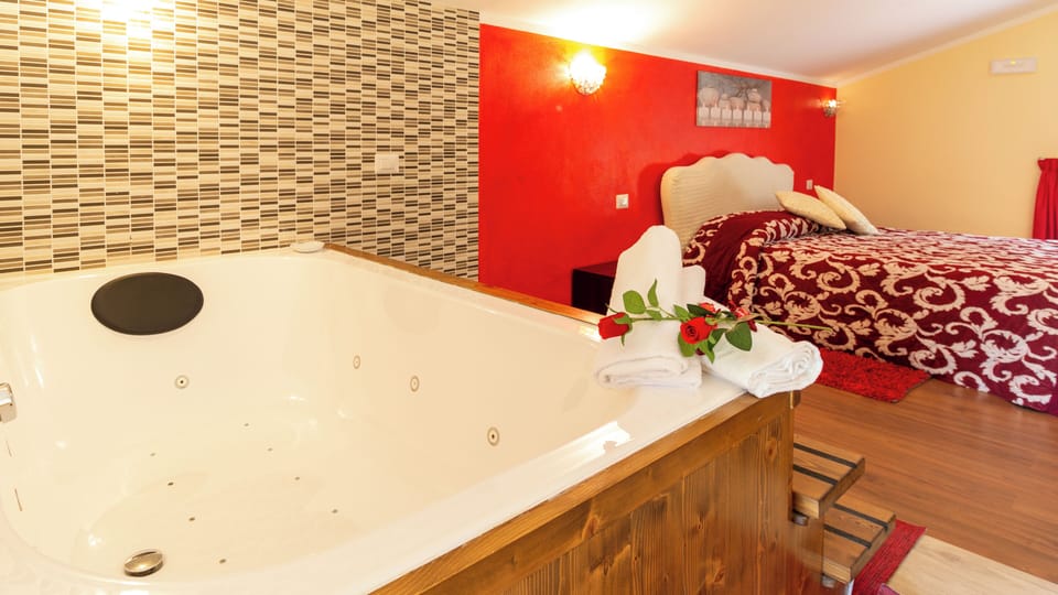Luxury Suite, Garden View | In-room safe, desk, laptop workspace, free WiFi