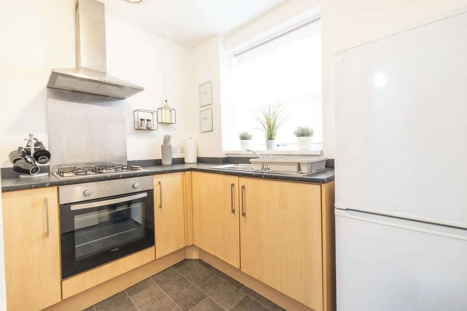 Bright kitchen corner with clean finishes and functional layout
