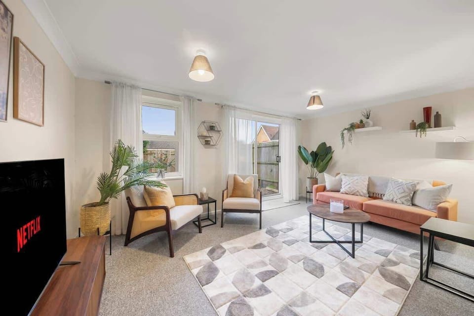 Stylish living area with comfortable seating and warm inviting atmosphere

