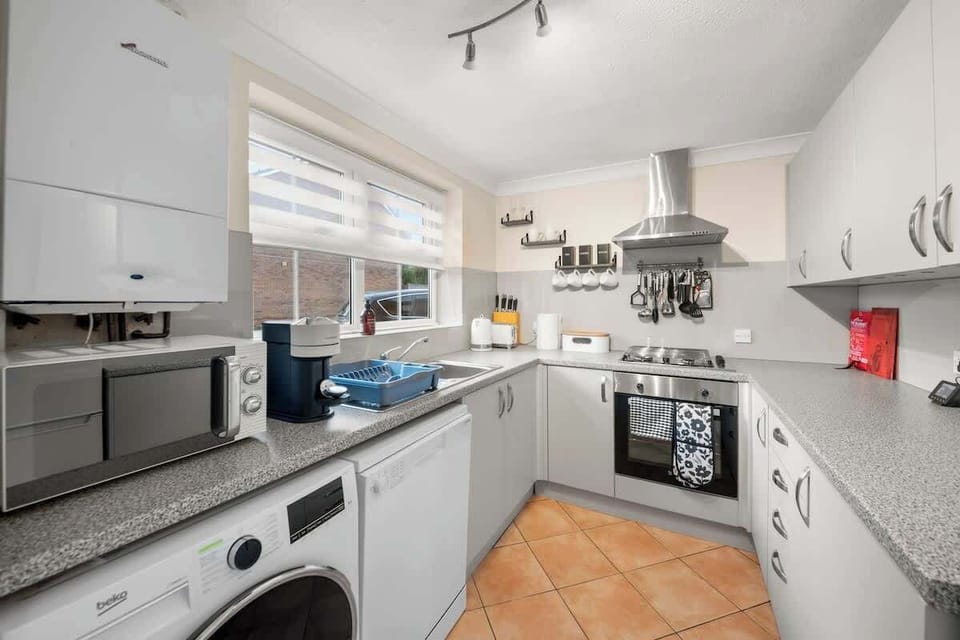 Compact functional kitchen with sleek design and practical everyday essentials