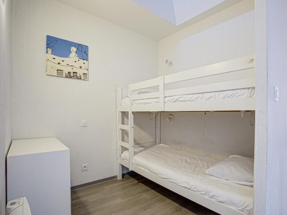 Bunk beds in the second upper sleeping area — great for younger guests