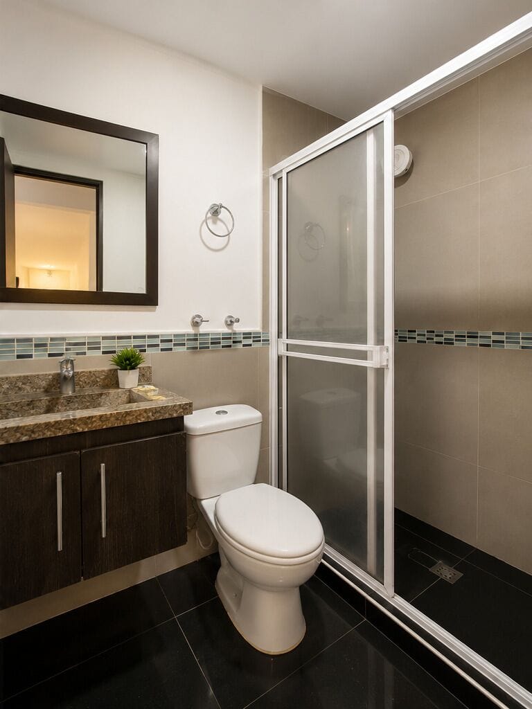 Shower, towels, soap, toilet paper