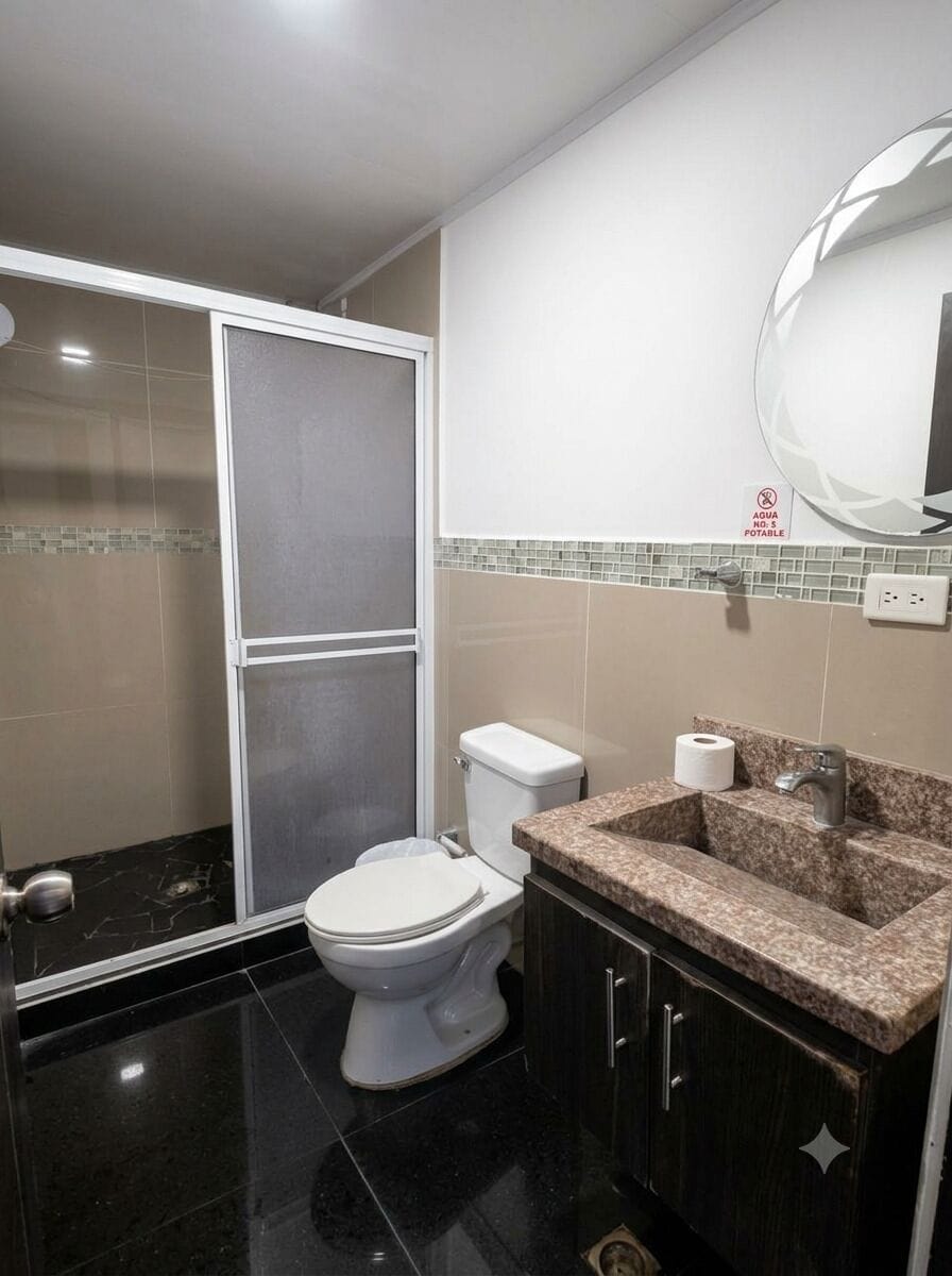 Quadruple Room | Bathroom | Shower, towels, soap, toilet paper