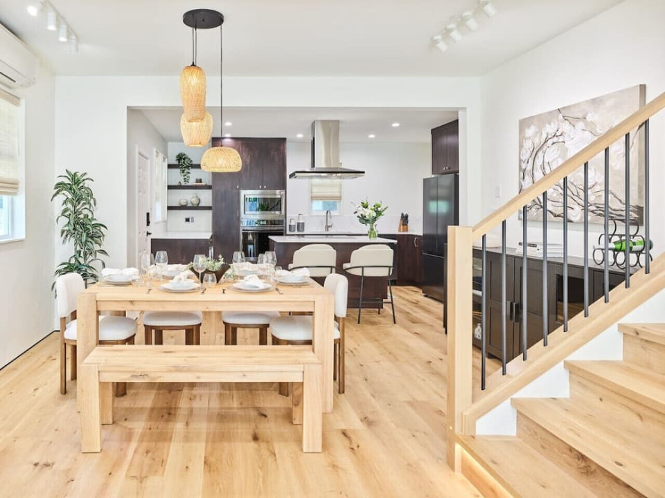 Open dining space connected to a modern kitchen.