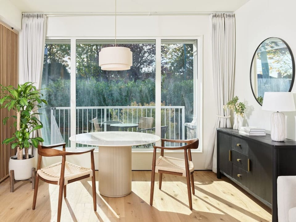 Spacious kitchen flowing into the dining area.