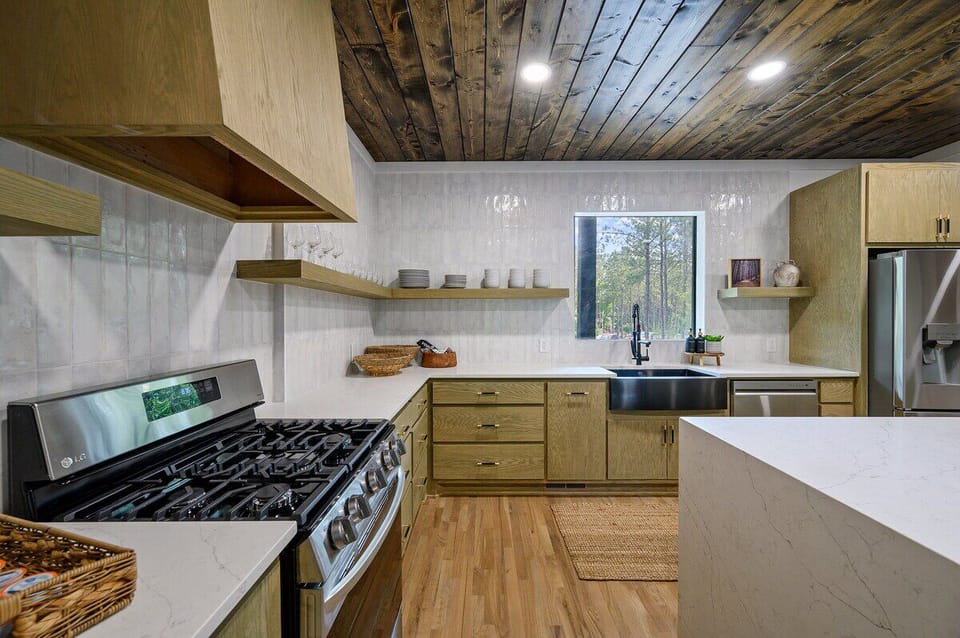 Clean lines, high-end touches, and plenty of space to cook and gather