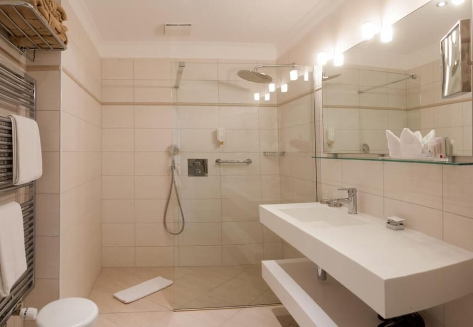 Family Quadruple Room, Balcony, Lake View | Bathroom | Bathrobes, slippers