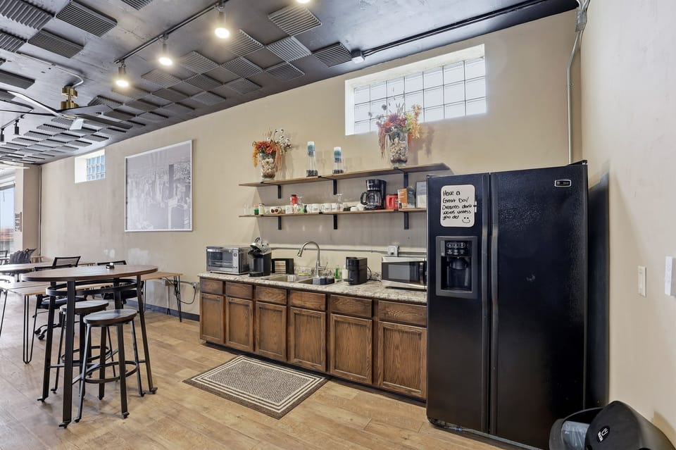 Grab a coffee and connect in a relaxed, shared space designed for comfort and conversation.