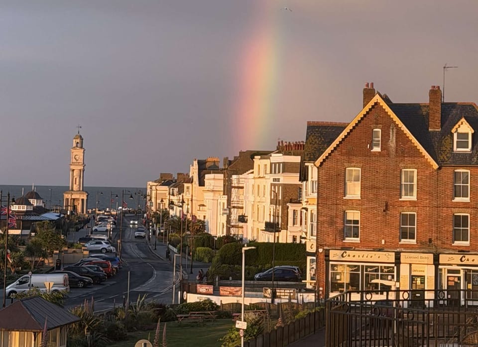 Where sunsets meet rainbows — a rare moment over Herne Bay