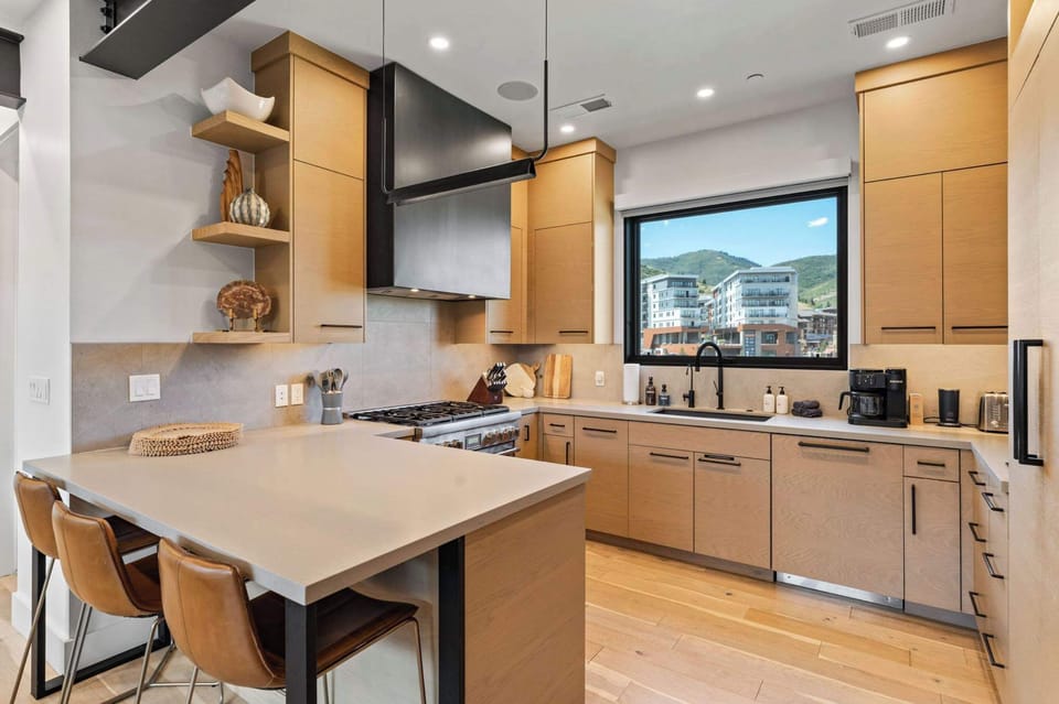 Chef's kitchen with island seating