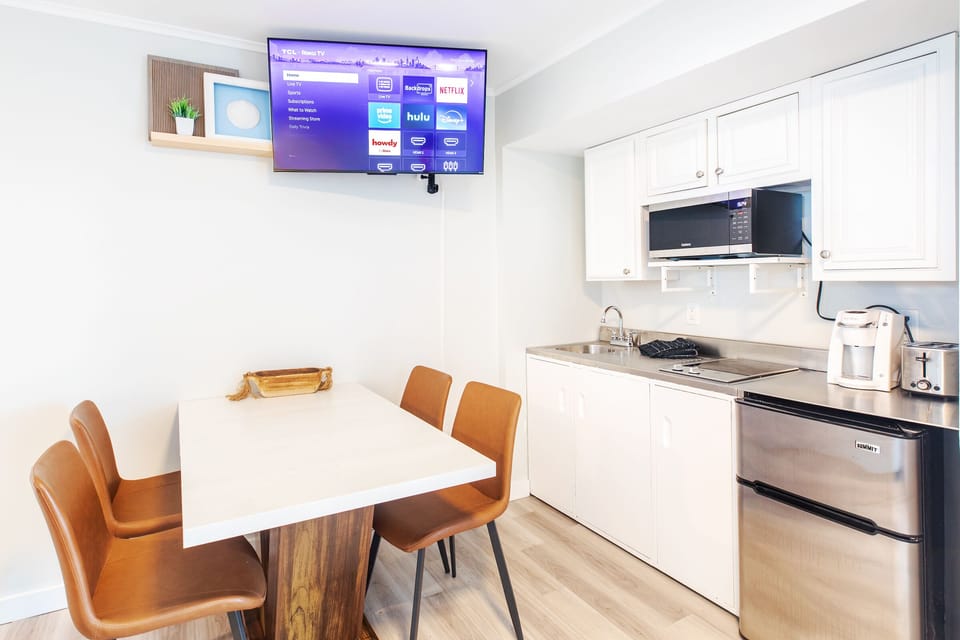 Fully stocked kitchenette with a dinning table that seats 4