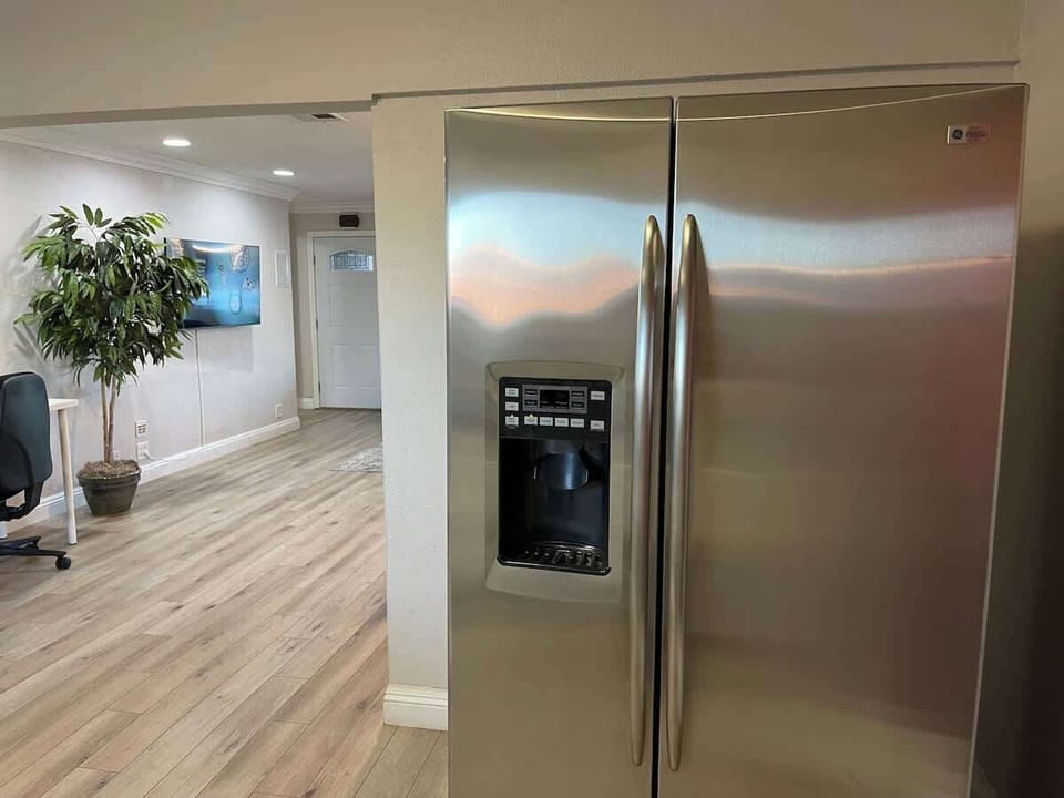 Full-sized refrigerator provided for your use. Please note: Ice maker is currently unusable; please bring your own ice.