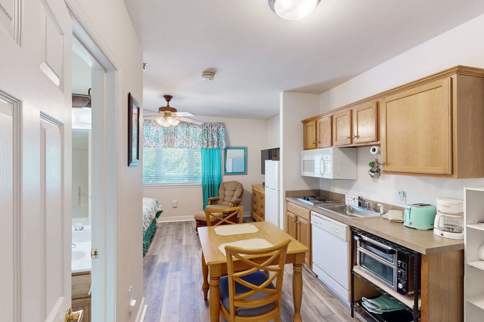 Studio, 1 King Bed, Pool Access, Garden View (The Pointe - Serenity Shores - 3204) | Private kitchen | Coffee/tea maker, fridge, microwave, oven