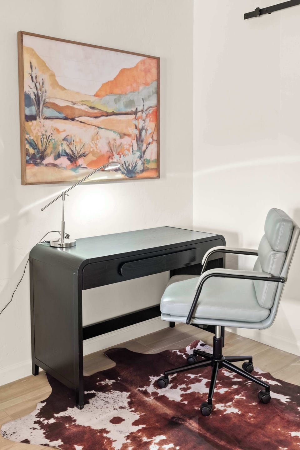 Stay Productive in Style – This sleek workspace features an elegant desk, comfortable ergonomic chair, giving you everything you need to stay connected and productive without sacrificing style.