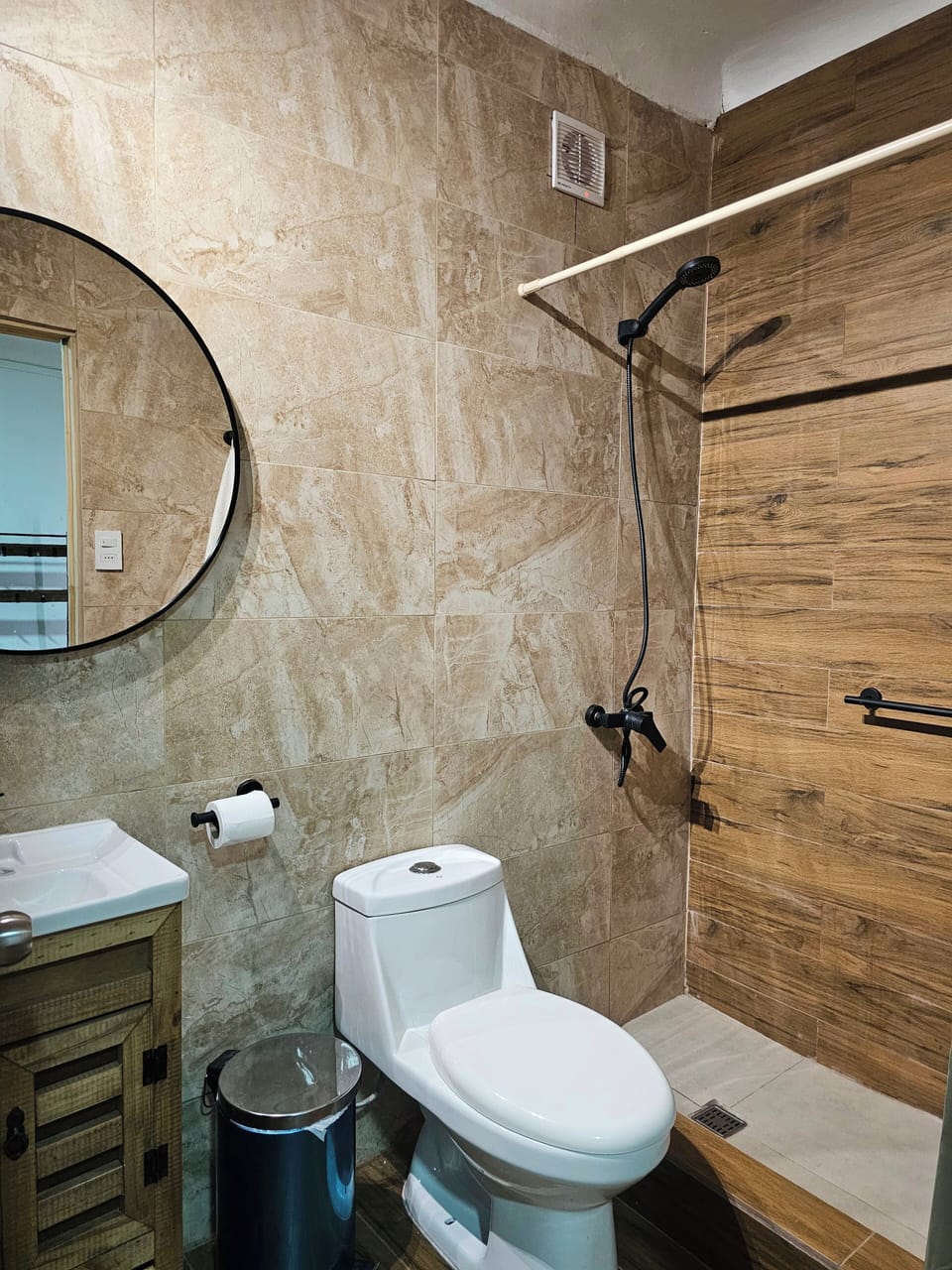 Shower, rainfall showerhead, hair dryer, towels