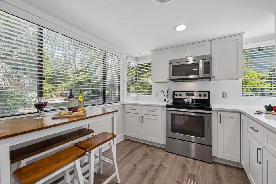 The kitchen is ready for slow mornings and easy evenings—whether you're brewing coffee before a beach walk or cooking up a family dinner after a day on the island.