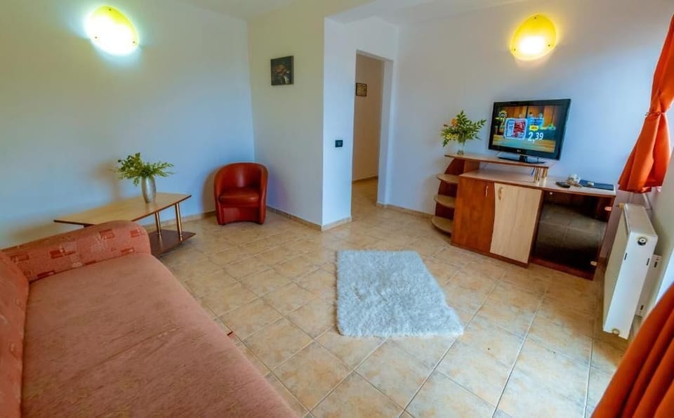 Suite, Balcony, Sea View | Living area | TV, printers