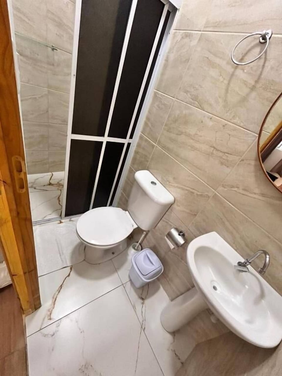 Shower, towels, soap, toilet paper