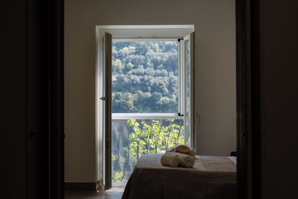 Deluxe Quadruple Room, Balcony, Hill View | Spa