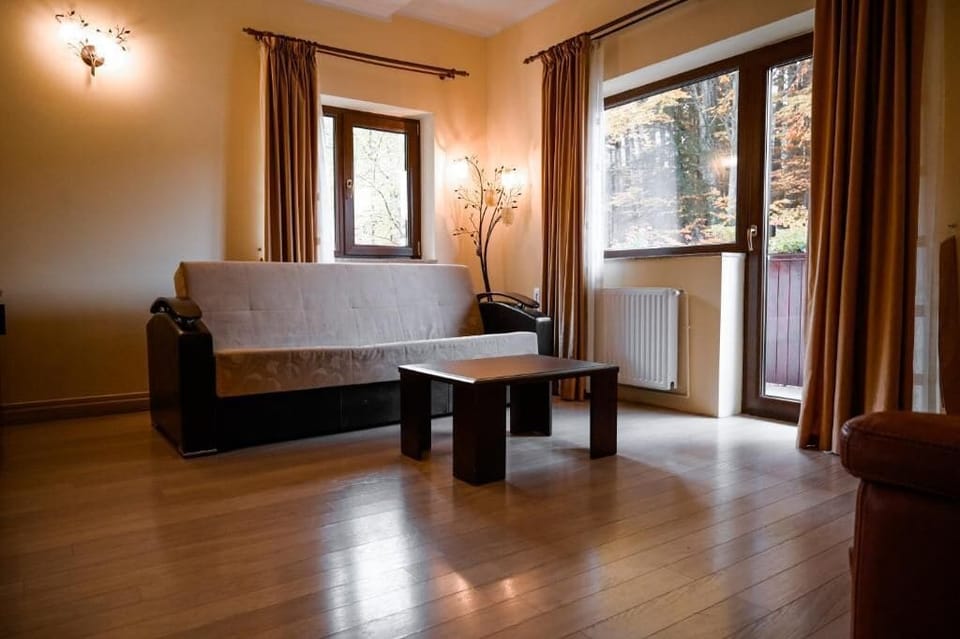 Family Suite, Balcony, Courtyard View | Living area | TV