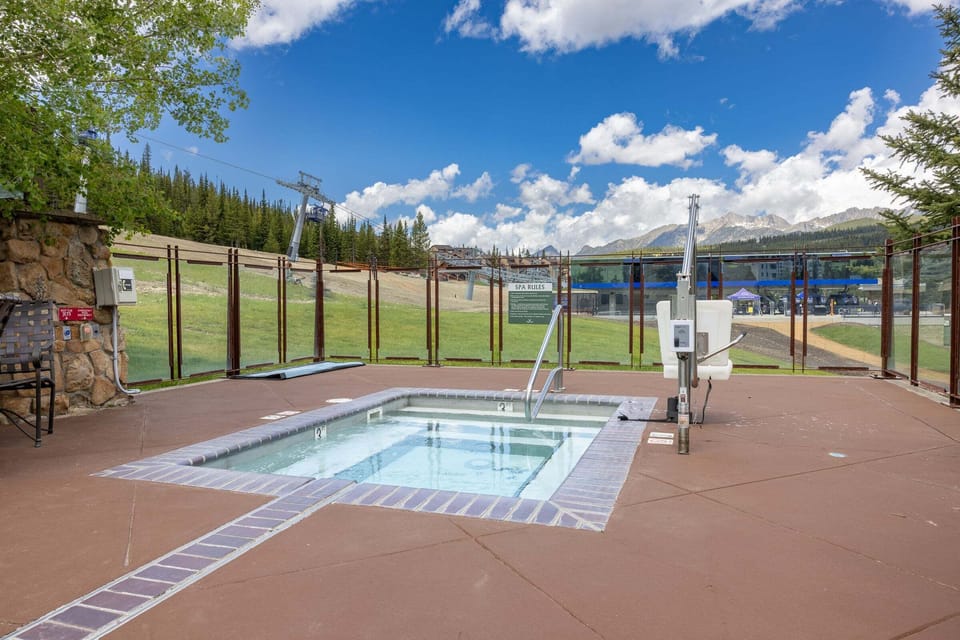 Outdoor hot tub, steamy soaks against the mountain backdrop, summer or ski season