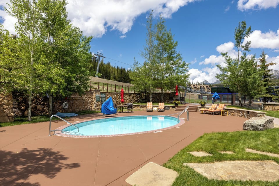 Outdoor community pool and hot tub, warm water for summer afternoons and ski-season evenings alike