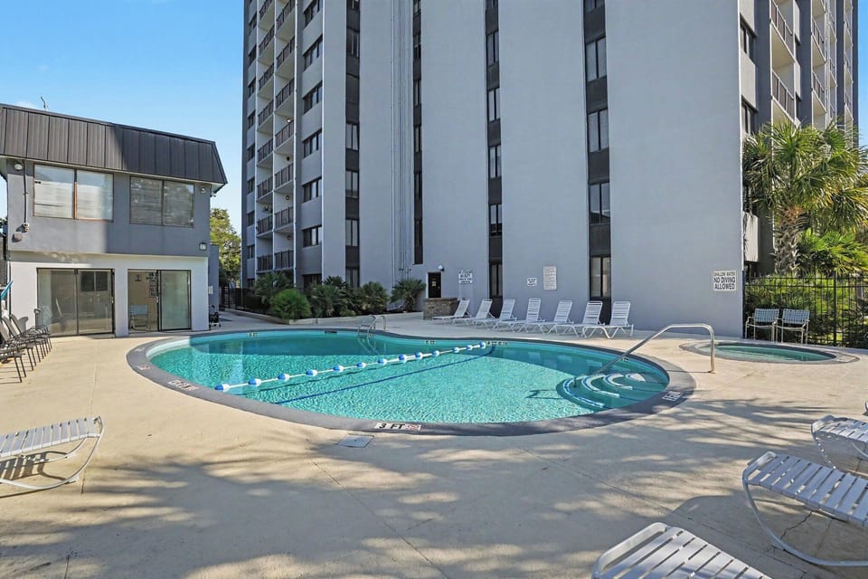 Splash into paradise 🏊‍♀️ Our sparkling pool is waiting for you. Lounge, swim, and soak up the ocean breeze between beach days.