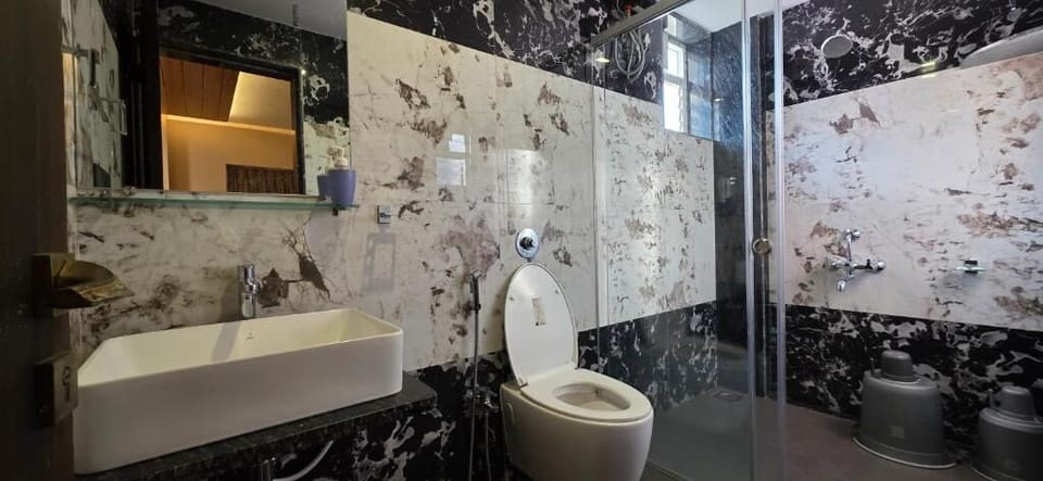 Deluxe Double Room, Patio, Mountain View | Bathroom | Shower, free toiletries, towels, soap