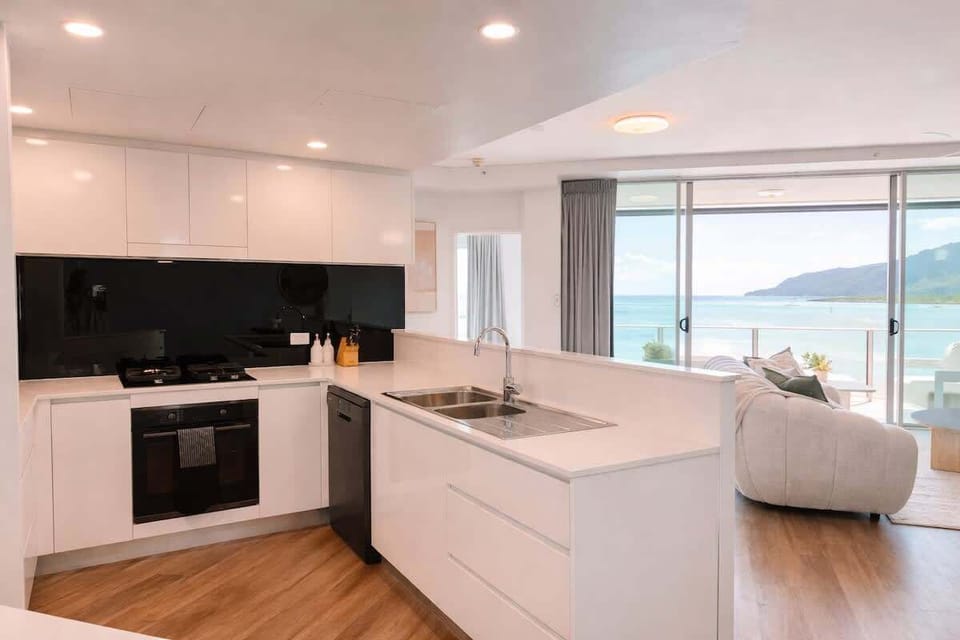 Beautiful and spacious modern kitchen with gorgeous views of the coral sea while cooking