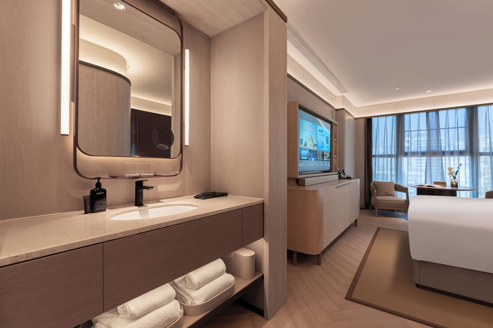 Business Double Room, Non Smoking, City View | Minibar (free items), desk, laptop workspace, blackout drapes