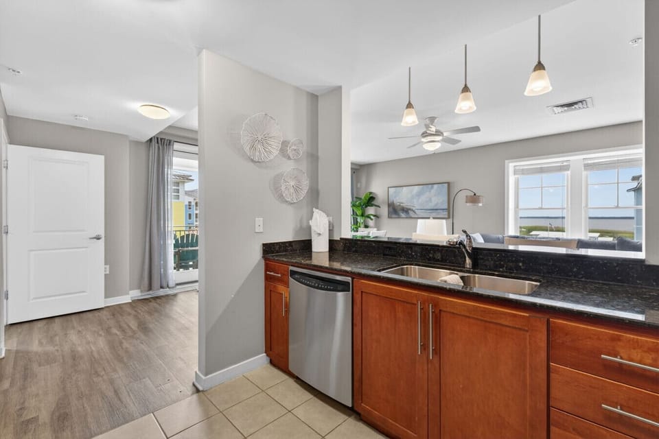 The open-concept kitchen keeps everyone connected—whether you`re making coffee, breakfast, or planning the day’s adventures.