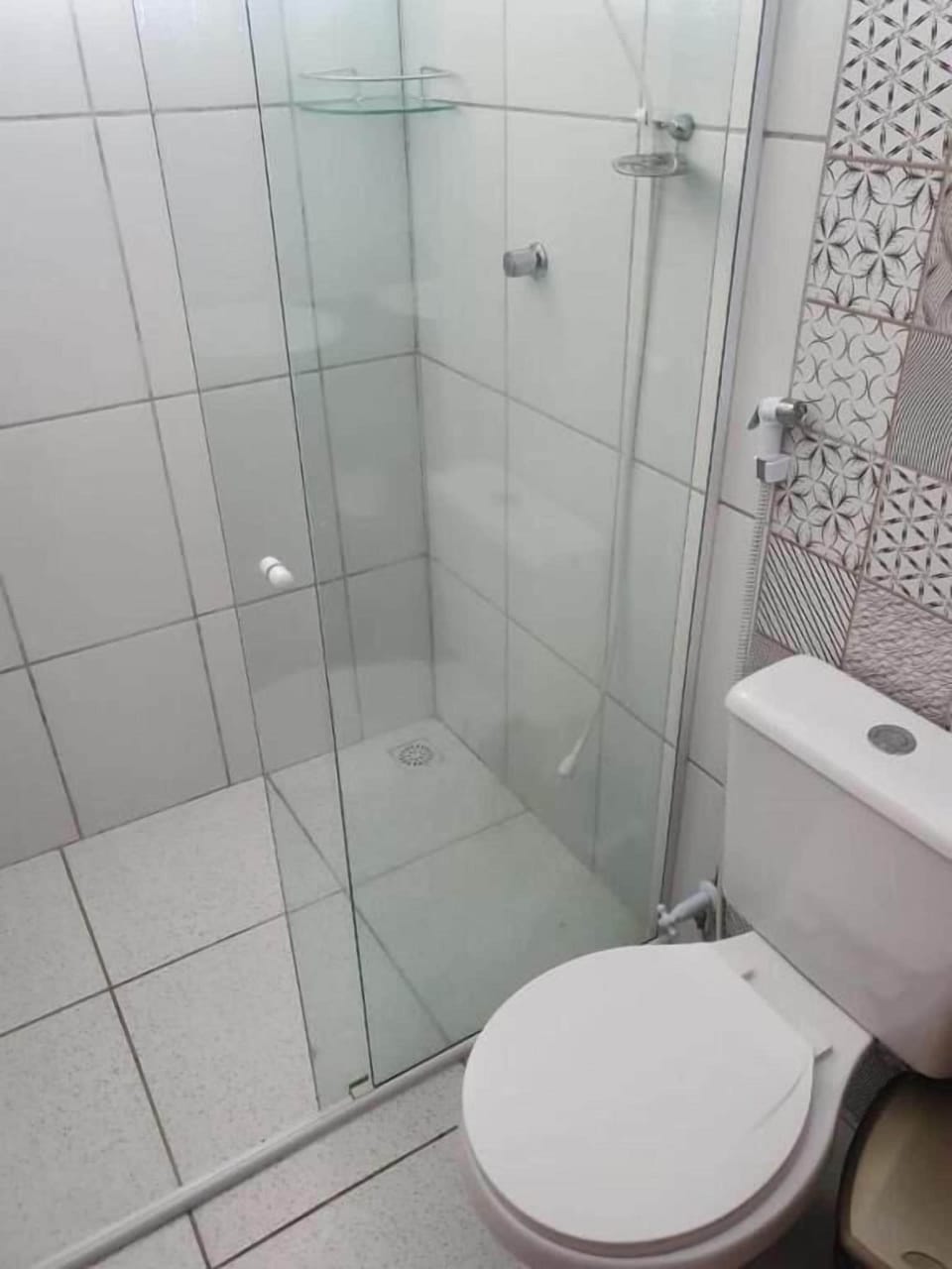 Shower, free toiletries, towels, toilet paper