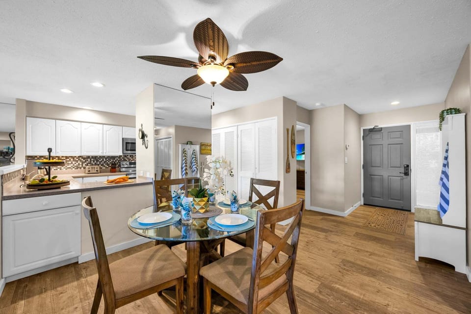Convenient dining area located next to the fully equipped kitchen, making meal prep and serving effortless