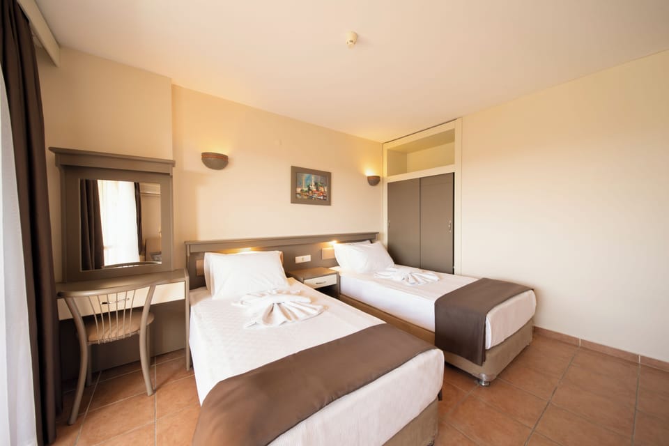 Standard Room, Balcony | Minibar, free WiFi, bed sheets, wheelchair access