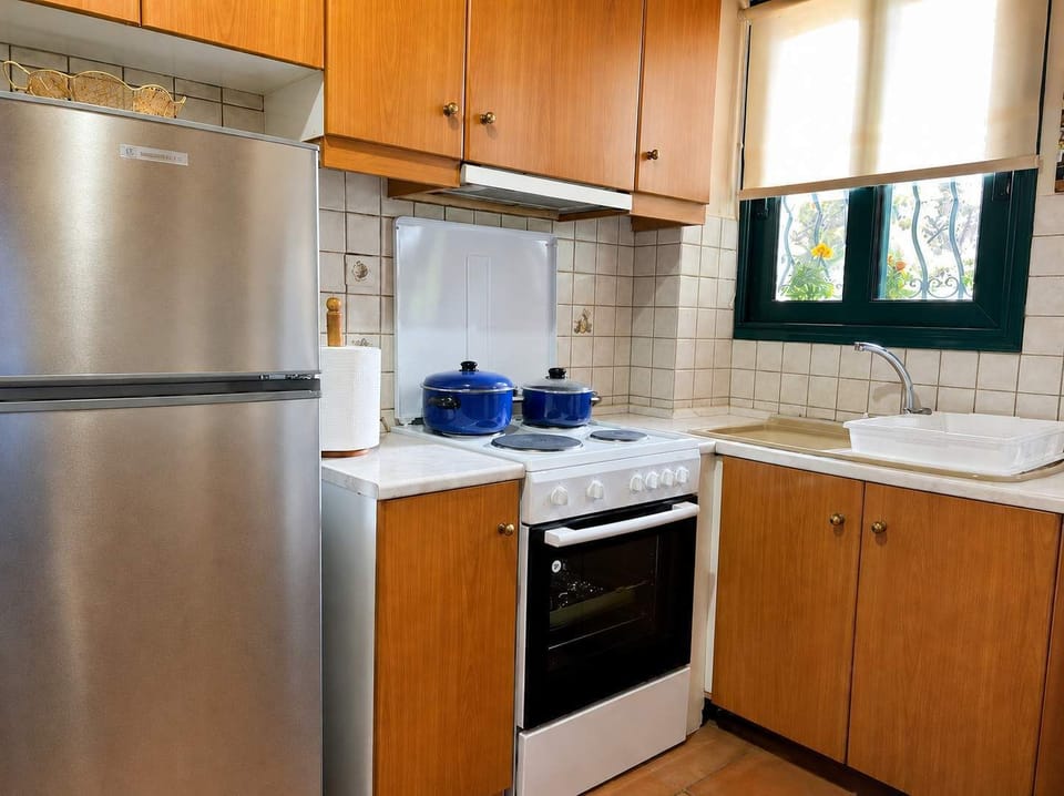 Fully equipped kitchen with modern appliances, plenty of storage and everything needed to prepare meals for couples, families or longer stays