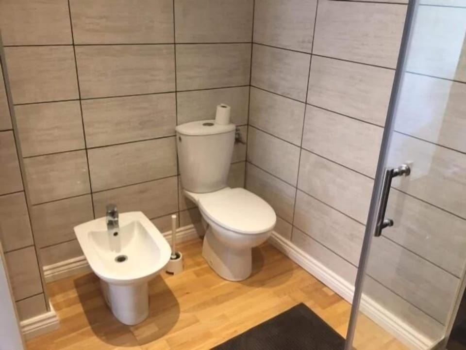Standard Double Room, Garden View | Bathroom | Hair dryer, slippers, towels, soap