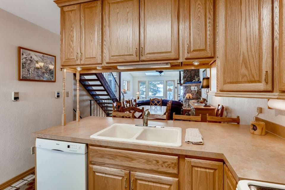 Kitchen Looks Out to Dining/Living Room