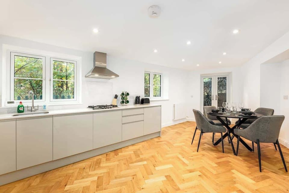 Fully equipped kitchen with stainless appliances and clean design - cook up a full meal or a quick breakfast before heading out.