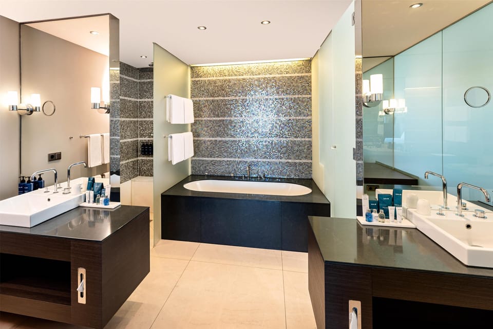 Shower, eco-friendly toiletries, hair dryer, towels